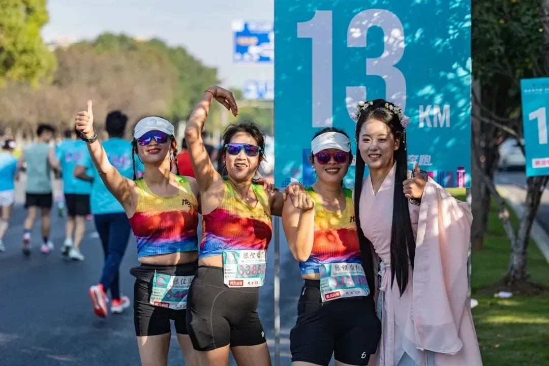 Runners on the Xishi Half Marathon course